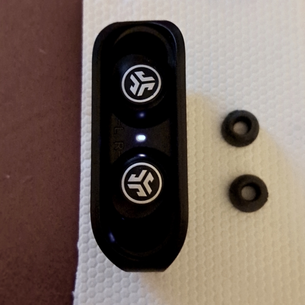 Wireless jlab Bluetooth  ear buds with case and extra pair of rubber for fitting